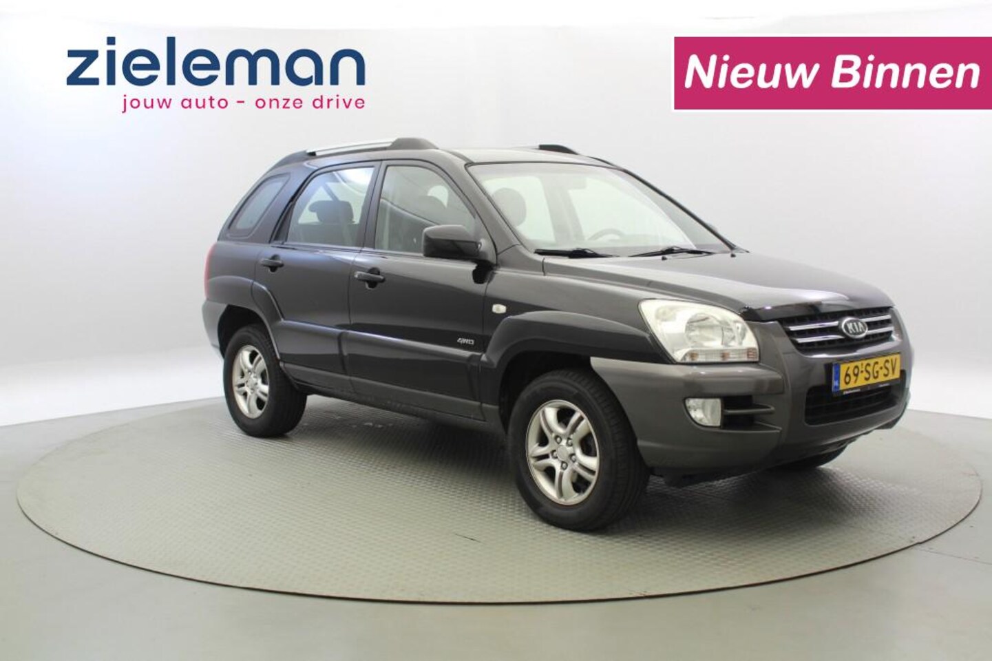 Kia Sportage - 2.0 CVVT Comfort - Cruise, Clima, Trekhaak - AutoWereld.nl