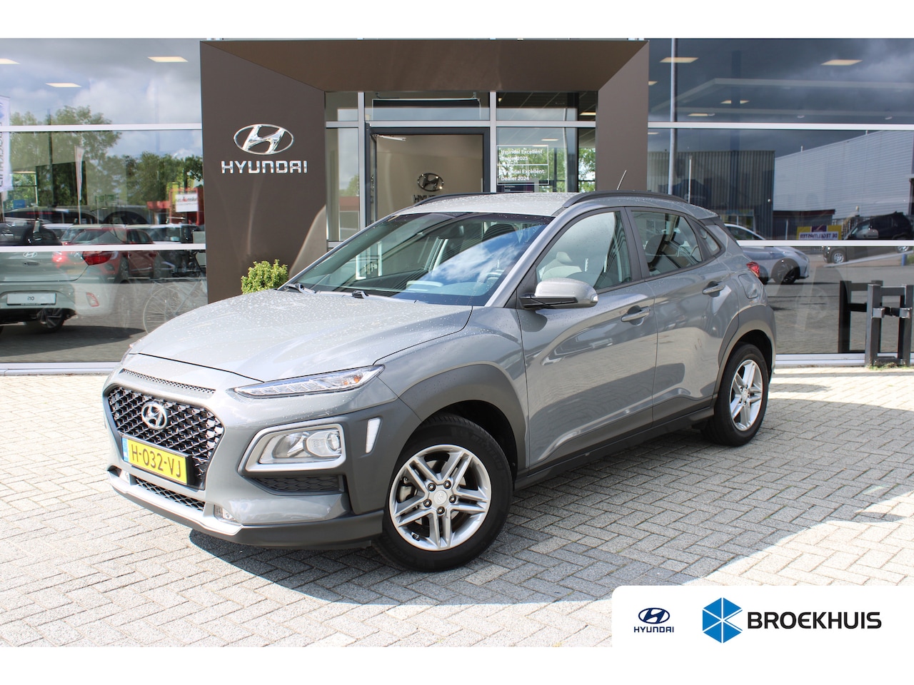 Hyundai Kona - 1.0 T-GDI Comfort | Achterbank in delen neerklapbaar | Achteruitrijcamera | Alarm klasse 1 - AutoWereld.nl