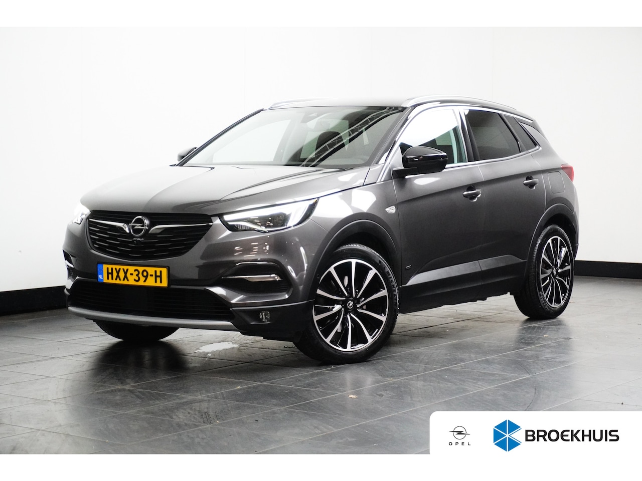 Opel Grandland X - Grandland 1.6 Turbo 225 pk Hybrid Ultimate Automaat Leder / 19"inch | Achterbank in delen - AutoWereld.nl