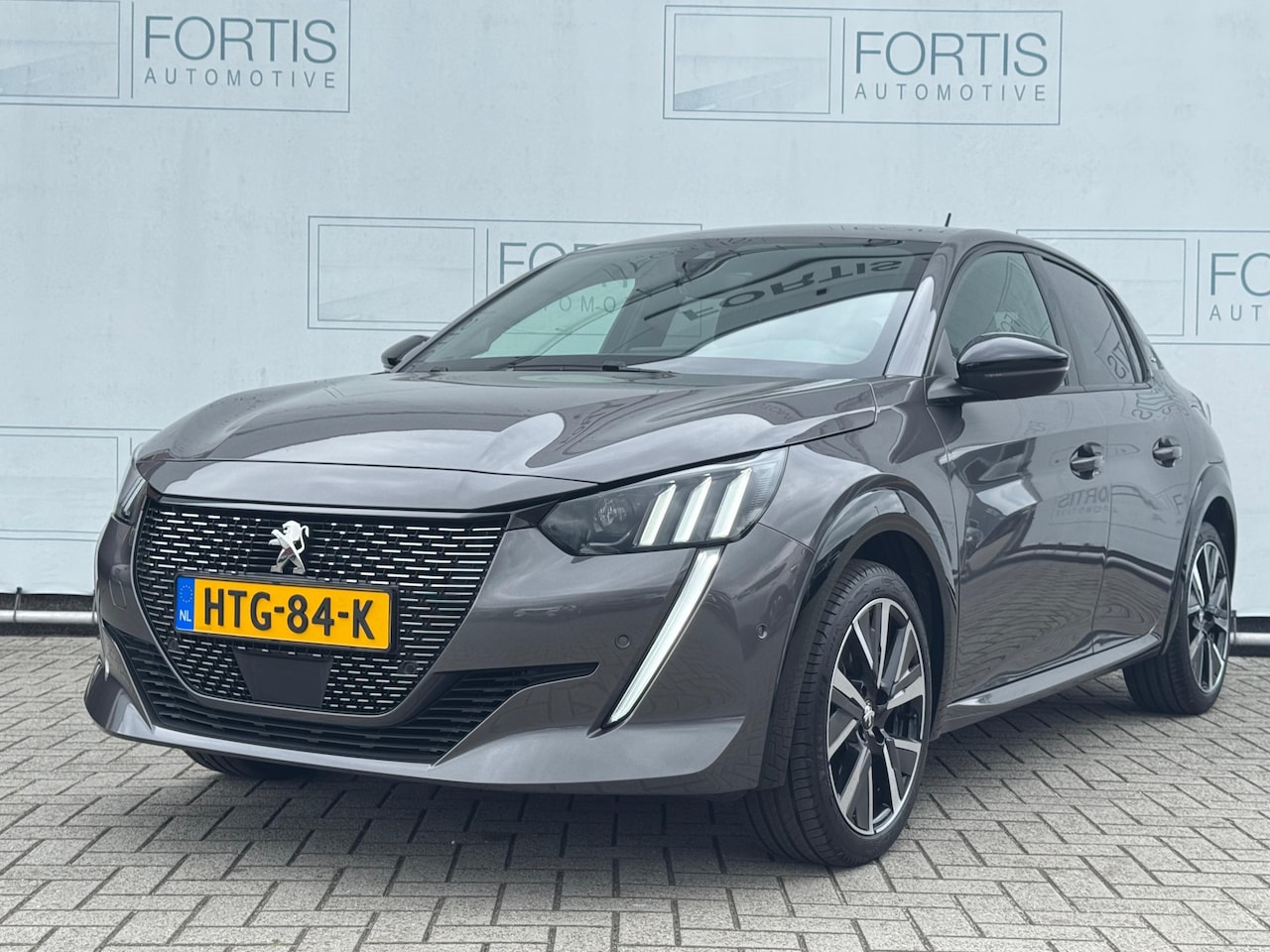 Peugeot 208 - 1.2 PureTech GT NAVI | CARPLAY | 1/2 LEDER - AutoWereld.nl