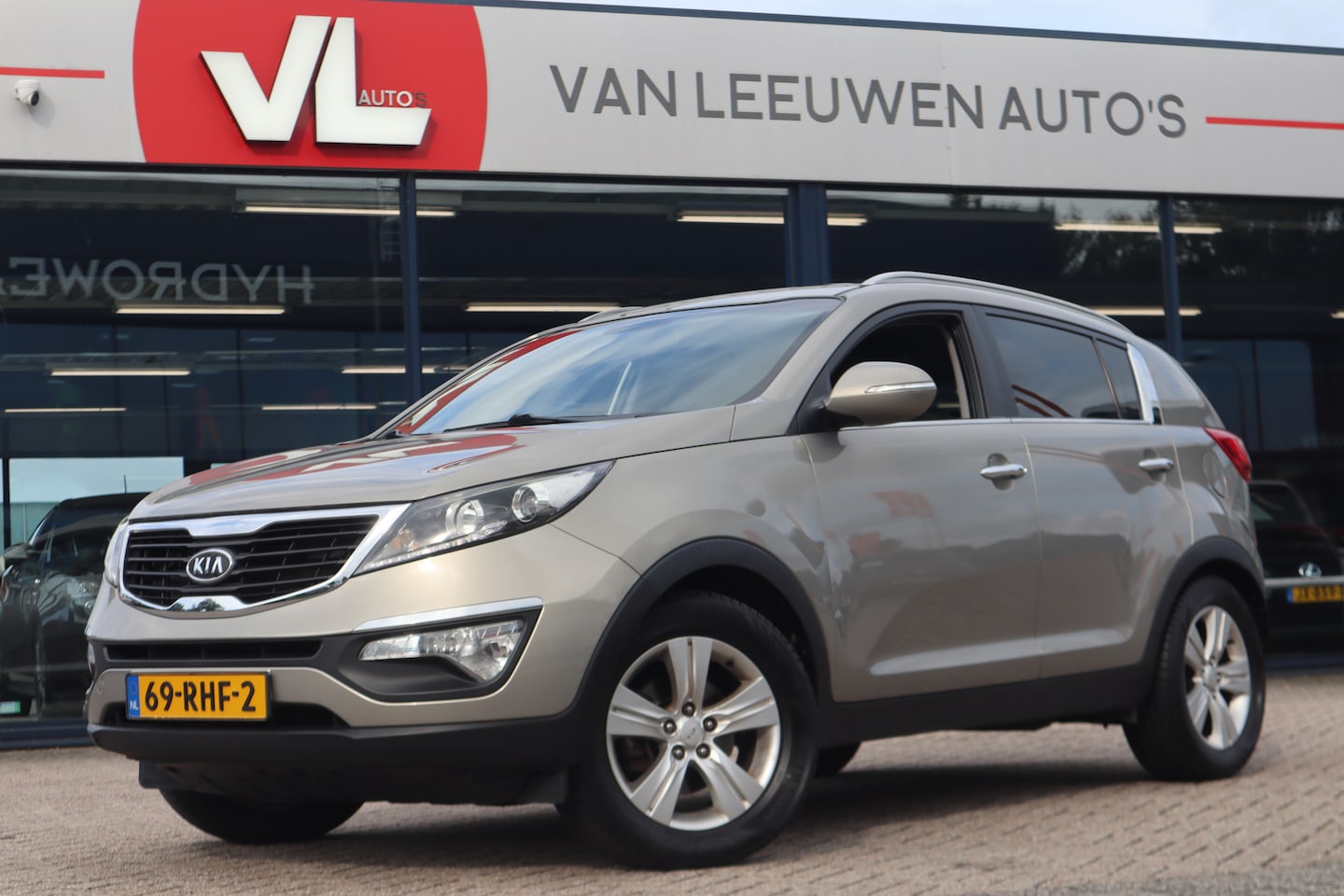 Kia Sportage - 1.6 GDI X-ecutive Plus Pack | Trekhaak | Cruise | Half Leder - AutoWereld.nl