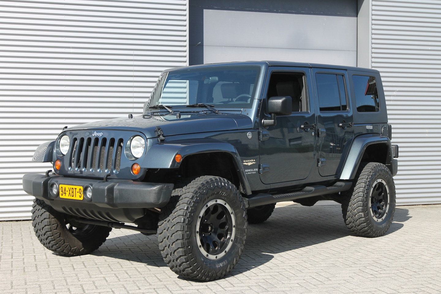 Jeep Wrangler Unlimited - 3.8 High Sport I Aut. I Hardtop I 4WD - AutoWereld.nl