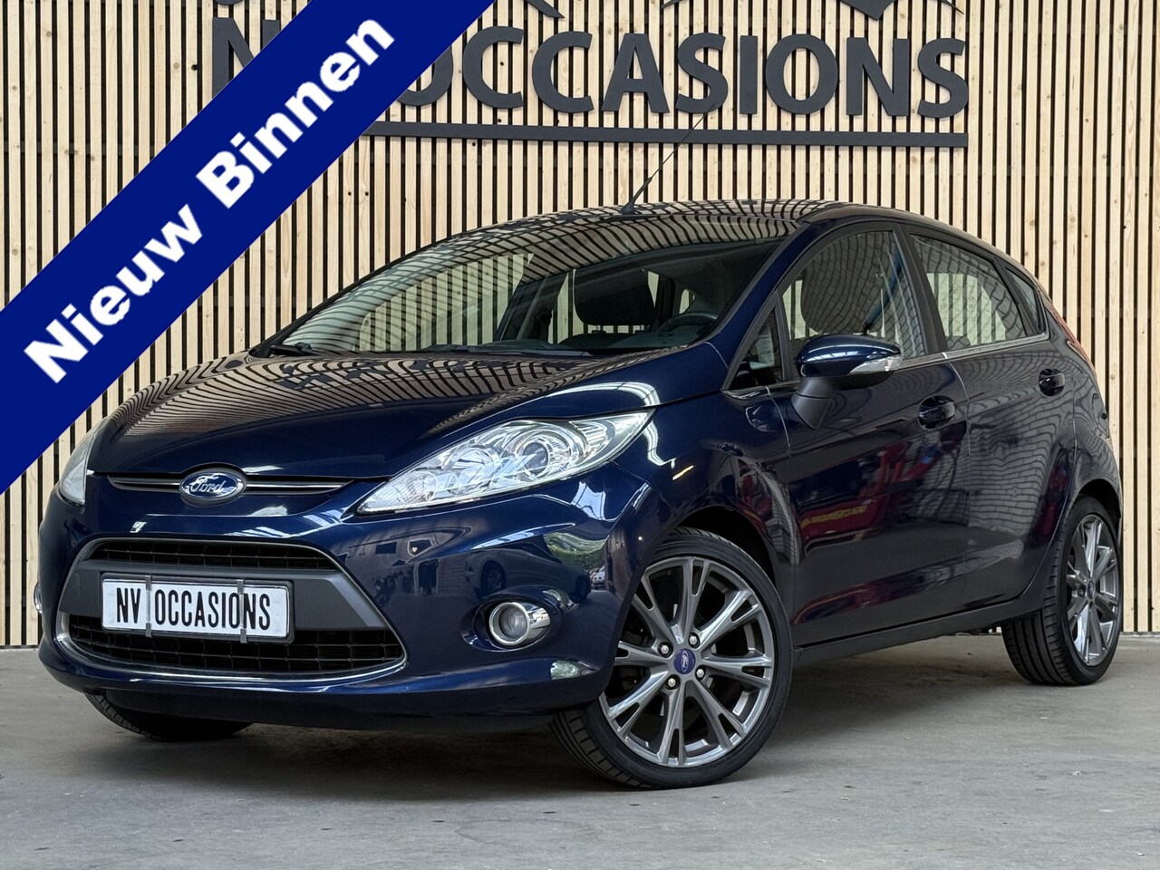 Ford Fiesta - 1.25 Titanium ECC/CRUISE/VOORRUITVW/17"/NAP/SPORTIEF! - AutoWereld.nl
