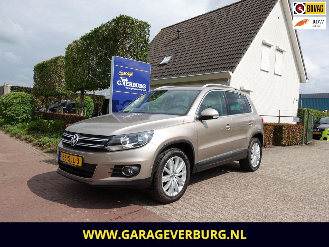 Volkswagen Tiguan - 1.4 TSI Sport&Style 161 Pk (Navigatie,Cruise,PDC) - AutoWereld.nl