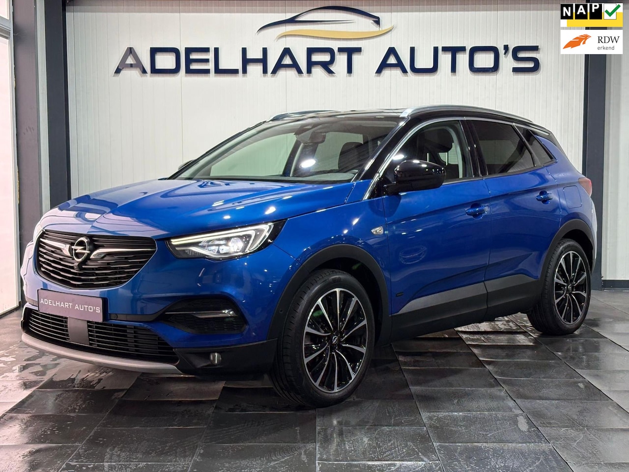 Opel Grandland X - 1.6 Turbo Hybrid4 Ultimate 300 PK Automaat / Navigatie full map / Lederen interieur / Came - AutoWereld.nl