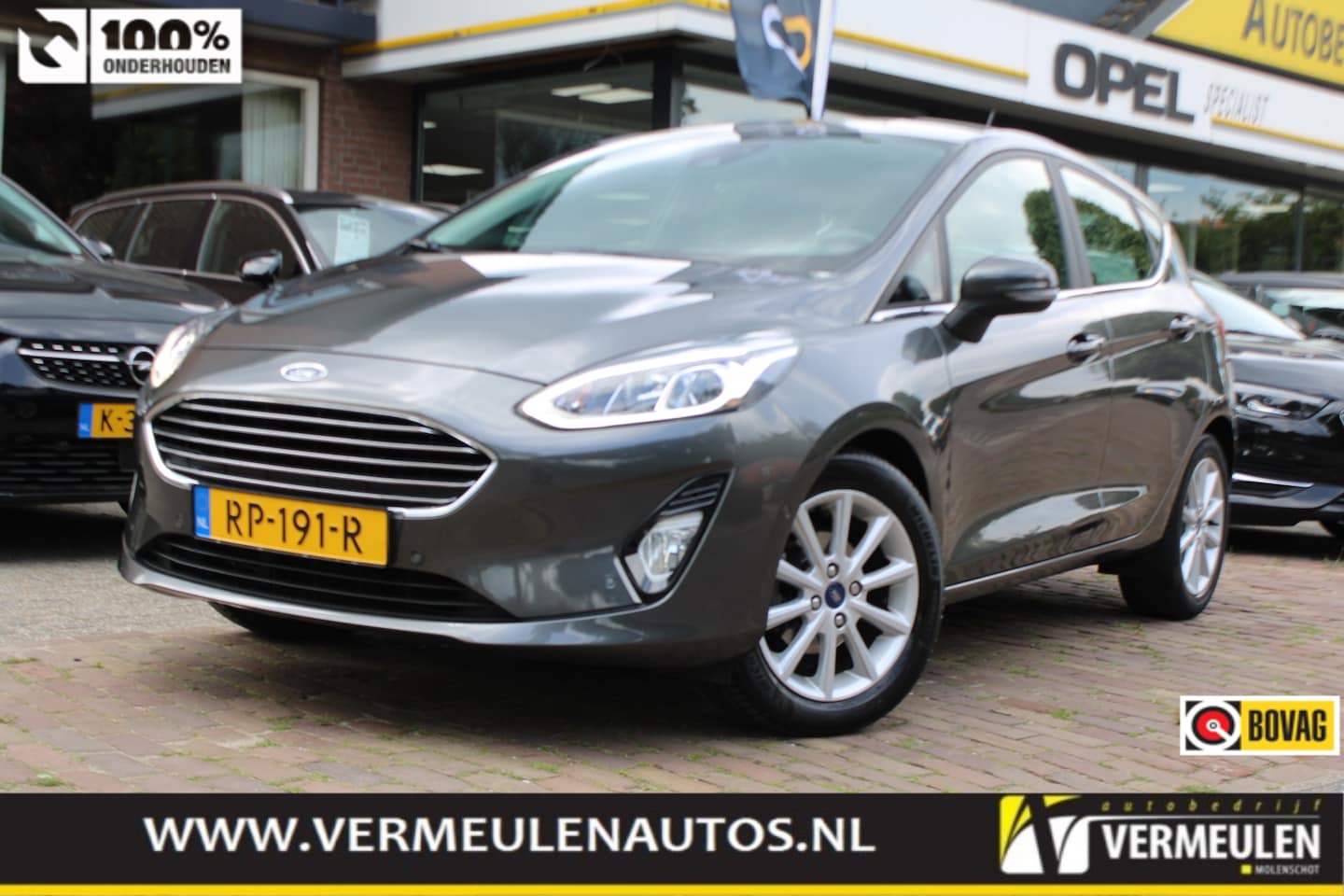 Ford Fiesta - 1.0 EcoBoost 100PK Titanium + 16''/ Navi/ Clima/ Cruise/ Camera/ Winterpakket/ Park-Assist - AutoWereld.nl