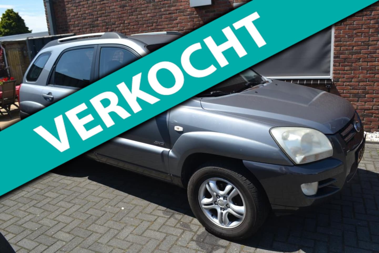 Kia Sportage - 2.0 CVVT Adventure 4WD HELE NETTE AUTO - AutoWereld.nl