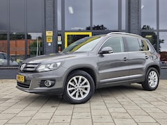Volkswagen Tiguan - 1.4 TSI Sport&Style Automaat | Parkeer Sensoren V + A | Climate Control | Navi | Tel