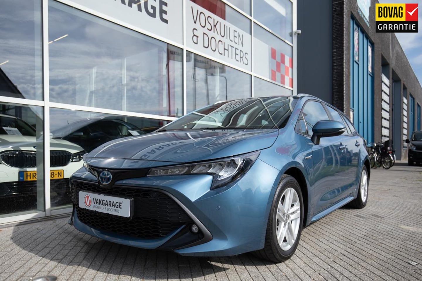 Toyota Corolla Touring Sports - 1.8 Hybrid Dynamic |Trekhaak | Camera - AutoWereld.nl