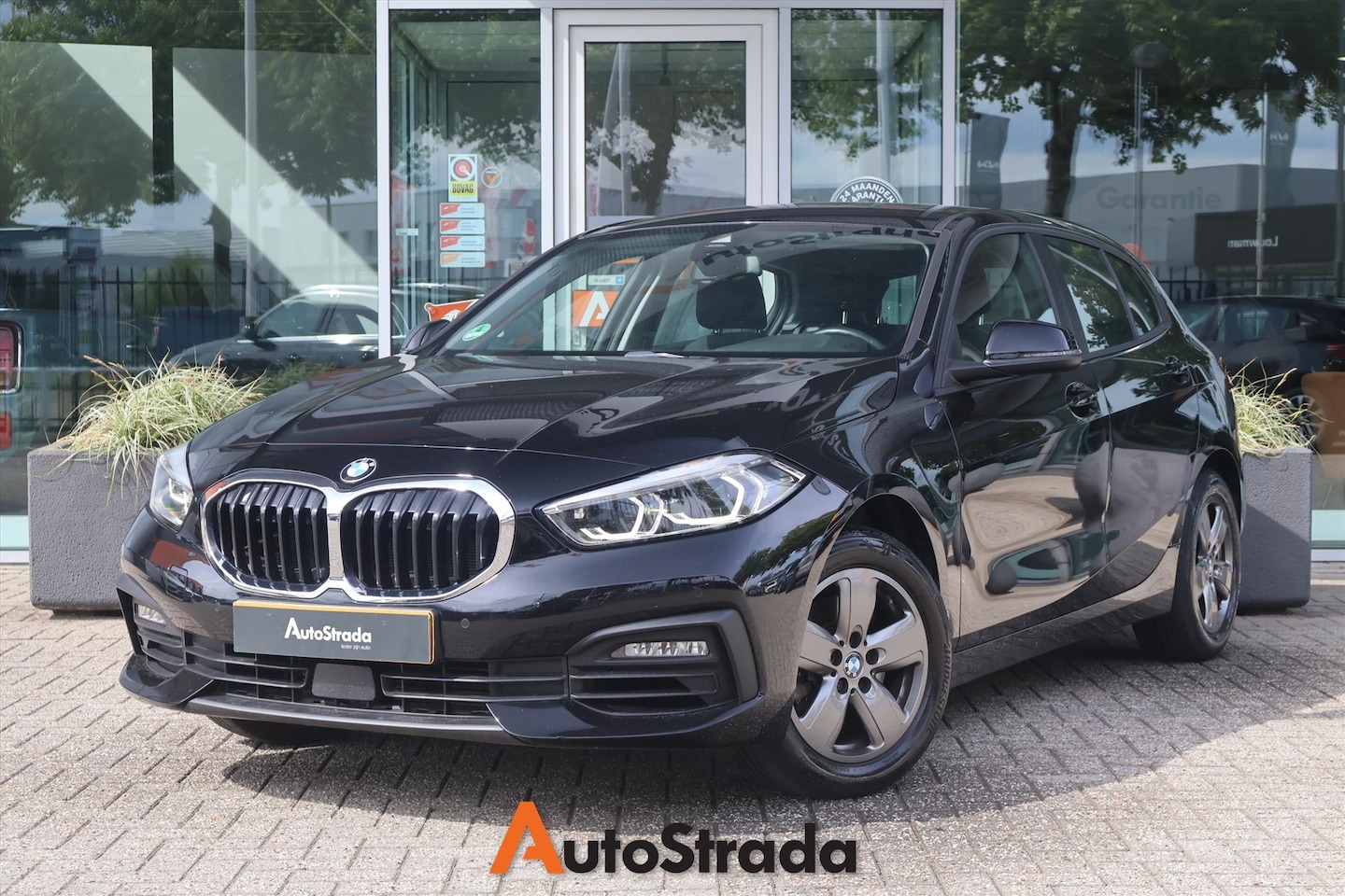 BMW 1-serie - (f40) 116i Business Edition 109pk | LED | Navi | Carplay | Virtual | Cruise | Climate | Se - AutoWereld.nl