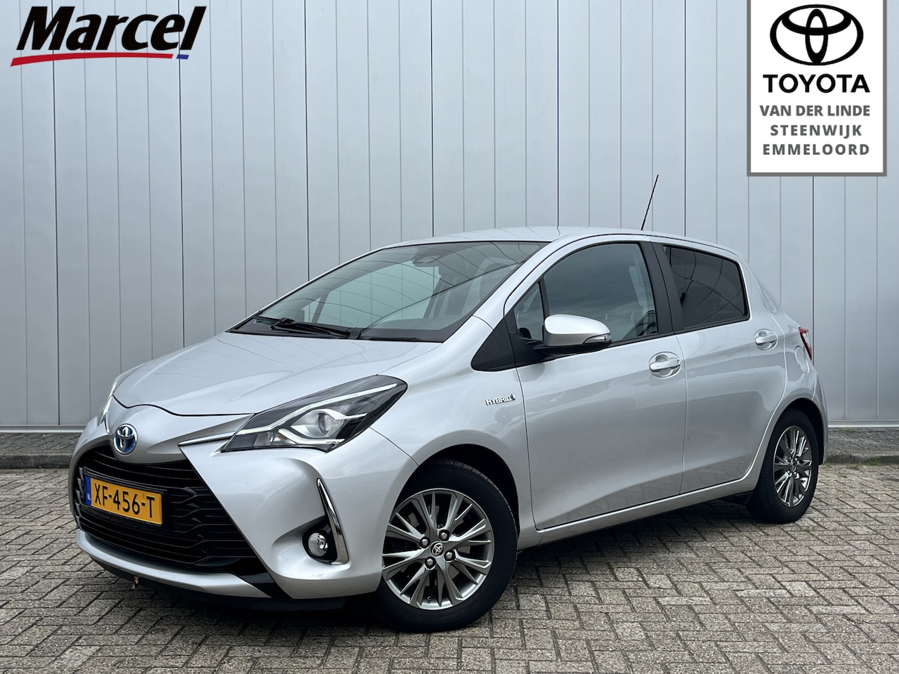 Toyota Yaris - 1.5 Hybrid Dynamic Navi Clima Cruise Trekhaak - AutoWereld.nl