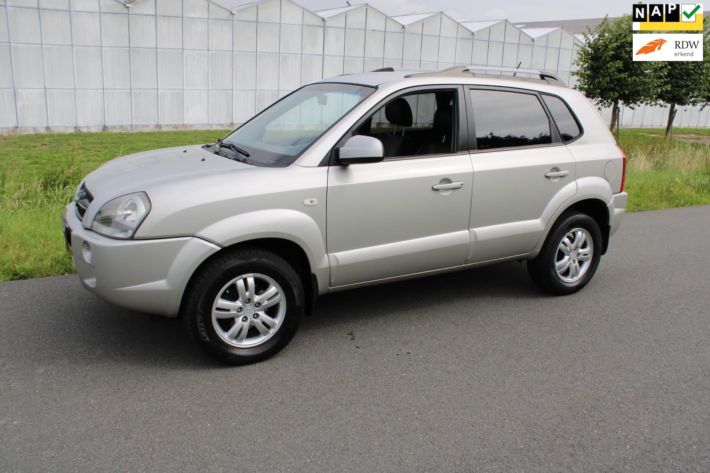 Hyundai Tucson - 2.0i Style Supreme met Leder en Climate control - AutoWereld.nl