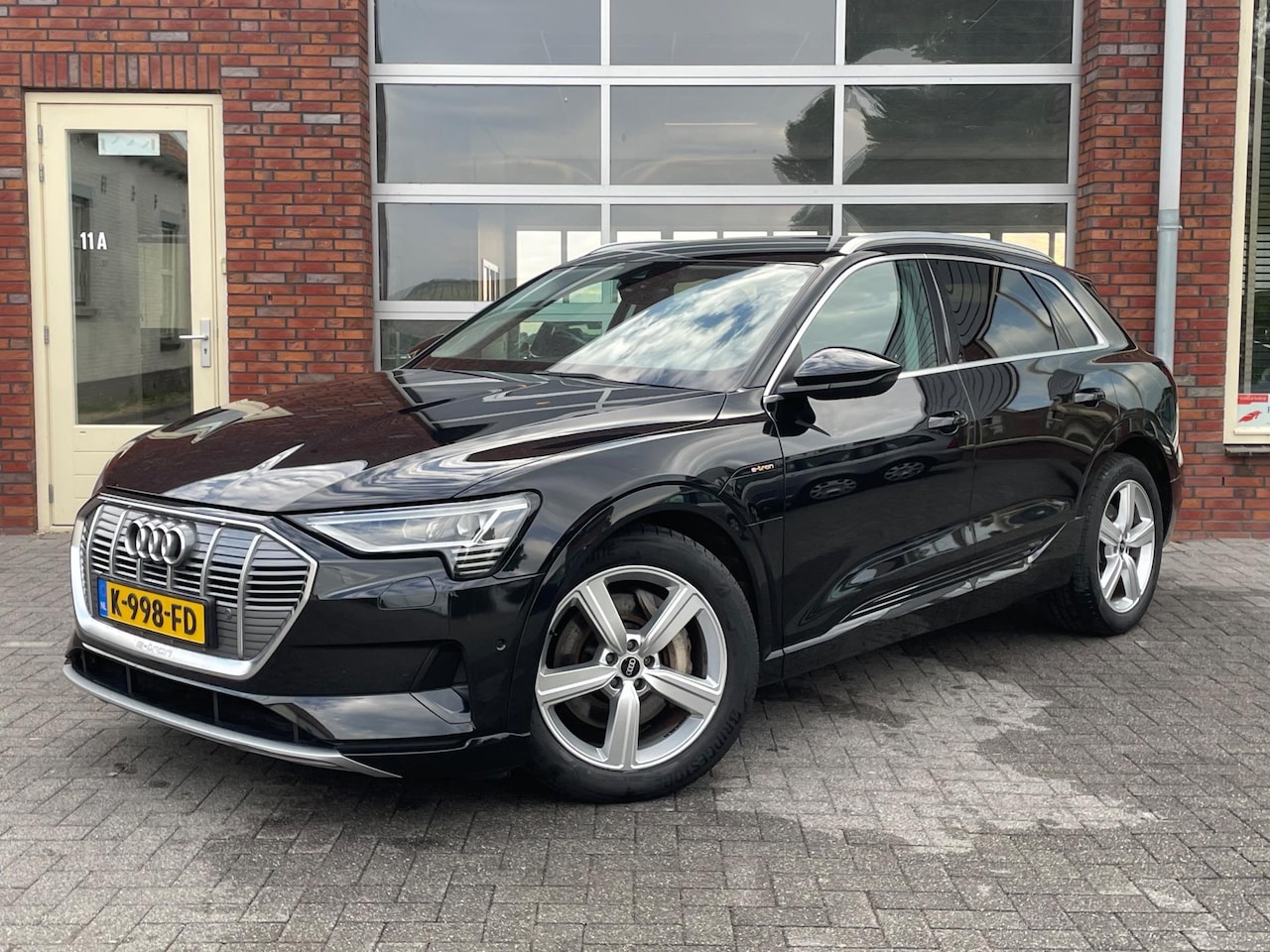 Audi e-tron - 55 quattro Business edition 95 kWh | SOH 95% | Cruise Control | Camera | Stoelverwarming | - AutoWereld.nl