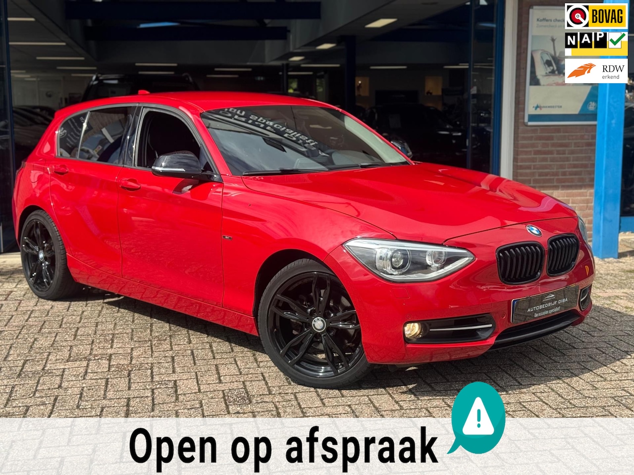 BMW 1-serie - 118i Business+ 2012 ROOD AUT NAVI AIRCO NAP! - AutoWereld.nl