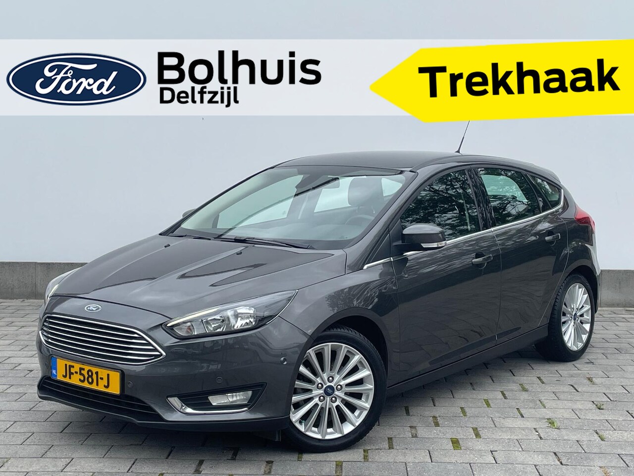 Ford Focus - Titanium HB | Verwarmde voorruit | Cruise | Parkeersens. | Trekhaak | Navi - AutoWereld.nl