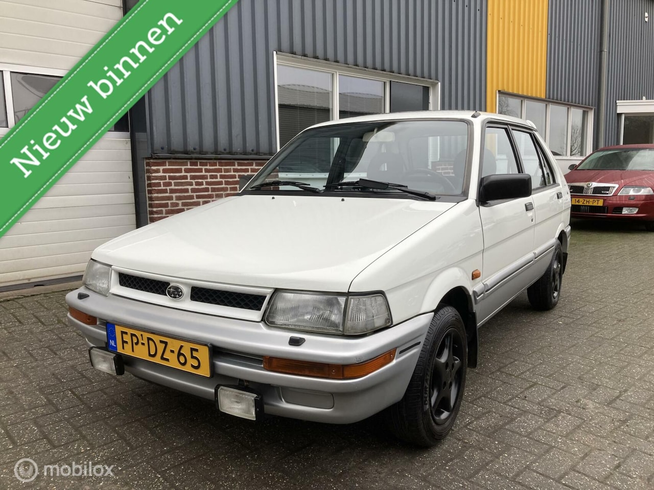 Subaru Justy - 1.2 GL II UNIEK!! NIEUWE KOPPELING! - AutoWereld.nl