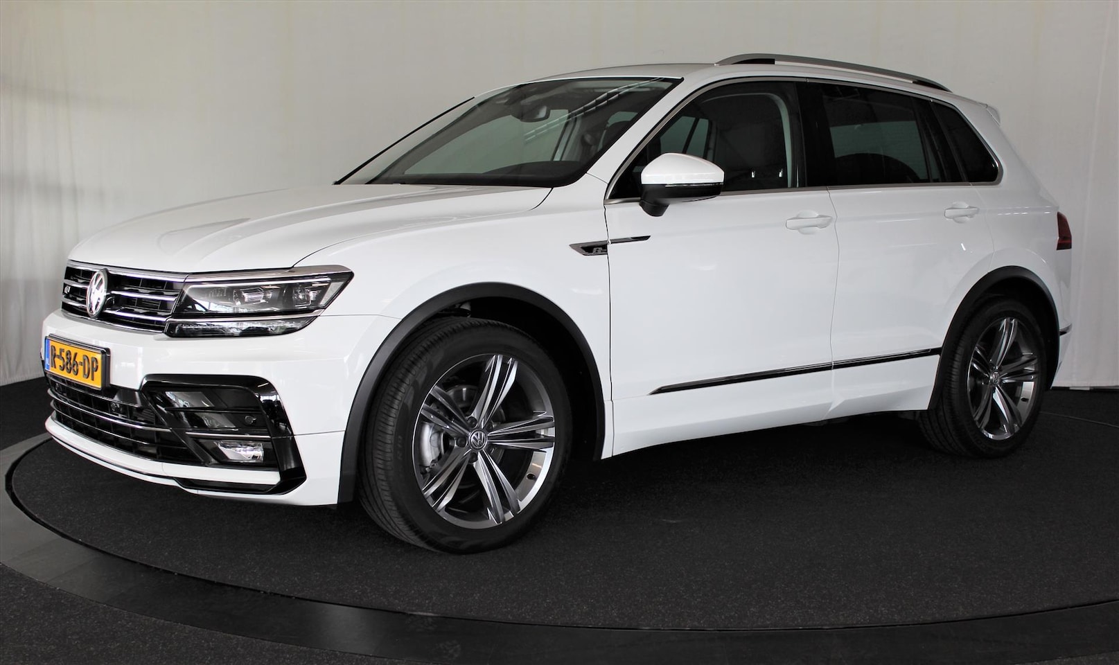 Volkswagen Tiguan - 1.4 TSI ACT 150pk DSG R-Line - AutoWereld.nl