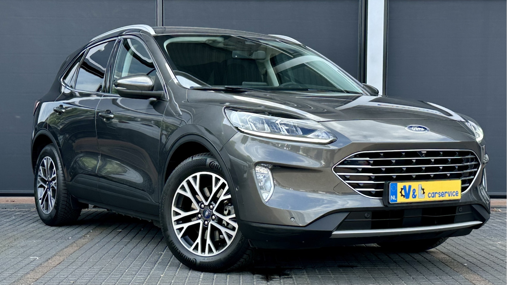 Ford Kuga - 2.5 PHEV Titanium / Stoelverwarm. V&A / Adapt. cruis / Elec. A klep / - AutoWereld.nl