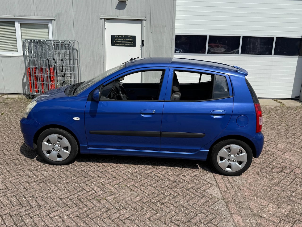 Kia Picanto - 1.0 D-light 1.0 D-light - AutoWereld.nl