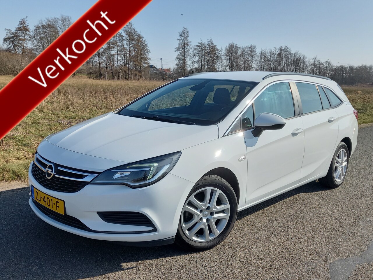 Opel Astra Sports Tourer - 1.0 Turbo Business 1.0 Turbo Business - AutoWereld.nl