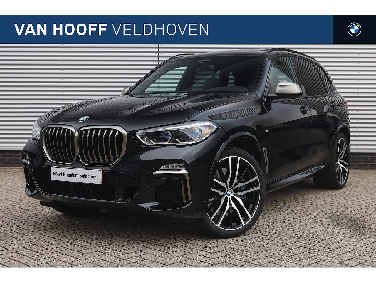 BMW X5 - M50i High Executive Automaat / Panoramadak / Trekhaak / Sportstoelen / Laserlight / Achter - AutoWereld.nl