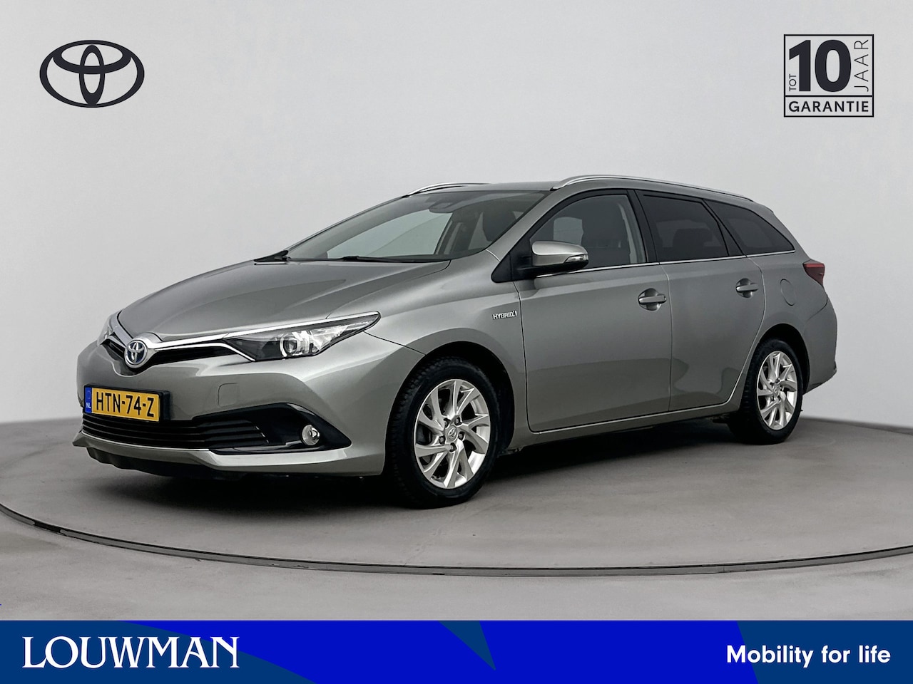 Toyota Auris Touring Sports - 1.8 Hybrid Dynamic Limited | Navigatie | Parkeercamera | Cruise Control | - AutoWereld.nl