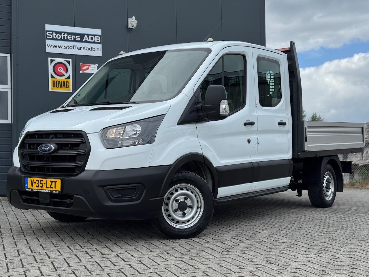 Ford Transit - 2.0 TDCI 130pk L2 DC Pick-up | 7-pers | Airco | Trekhaak 2550KG | Bluetooth | 2.4m x 2.1m - AutoWereld.nl