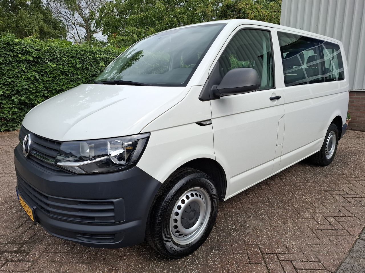 Volkswagen Transporter Kombi - 2.0 TDI L1H1 23995.- INCL BTW. 9-PERSOONS AIRCO 102PK - AutoWereld.nl