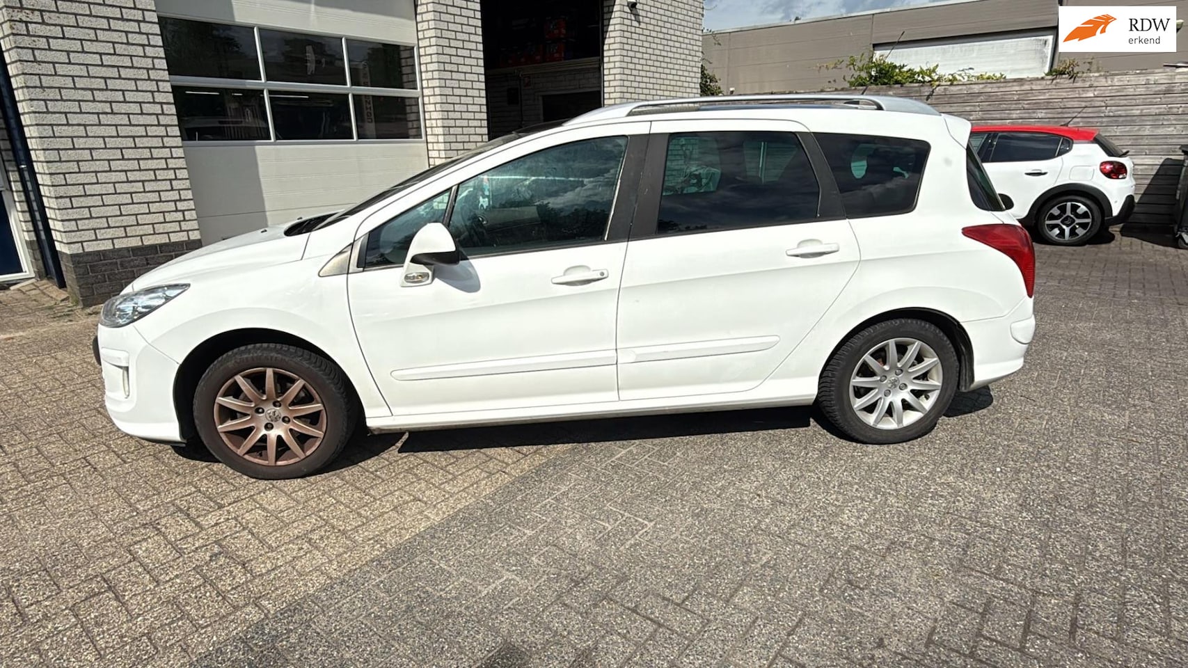 Peugeot 308 SW - 1.6 VTi XS koppakking head gasket defect - AutoWereld.nl