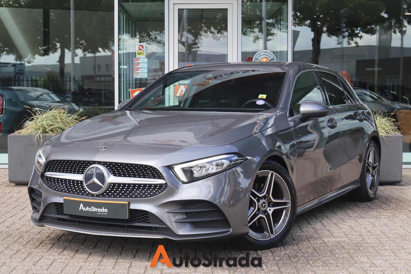 Mercedes-Benz A-klasse - A 180 AMG-Line 136pk 7G-DCT | Cruise | Climate | Camera | Navi | Stoelverwarming | Sfeer | - AutoWereld.nl