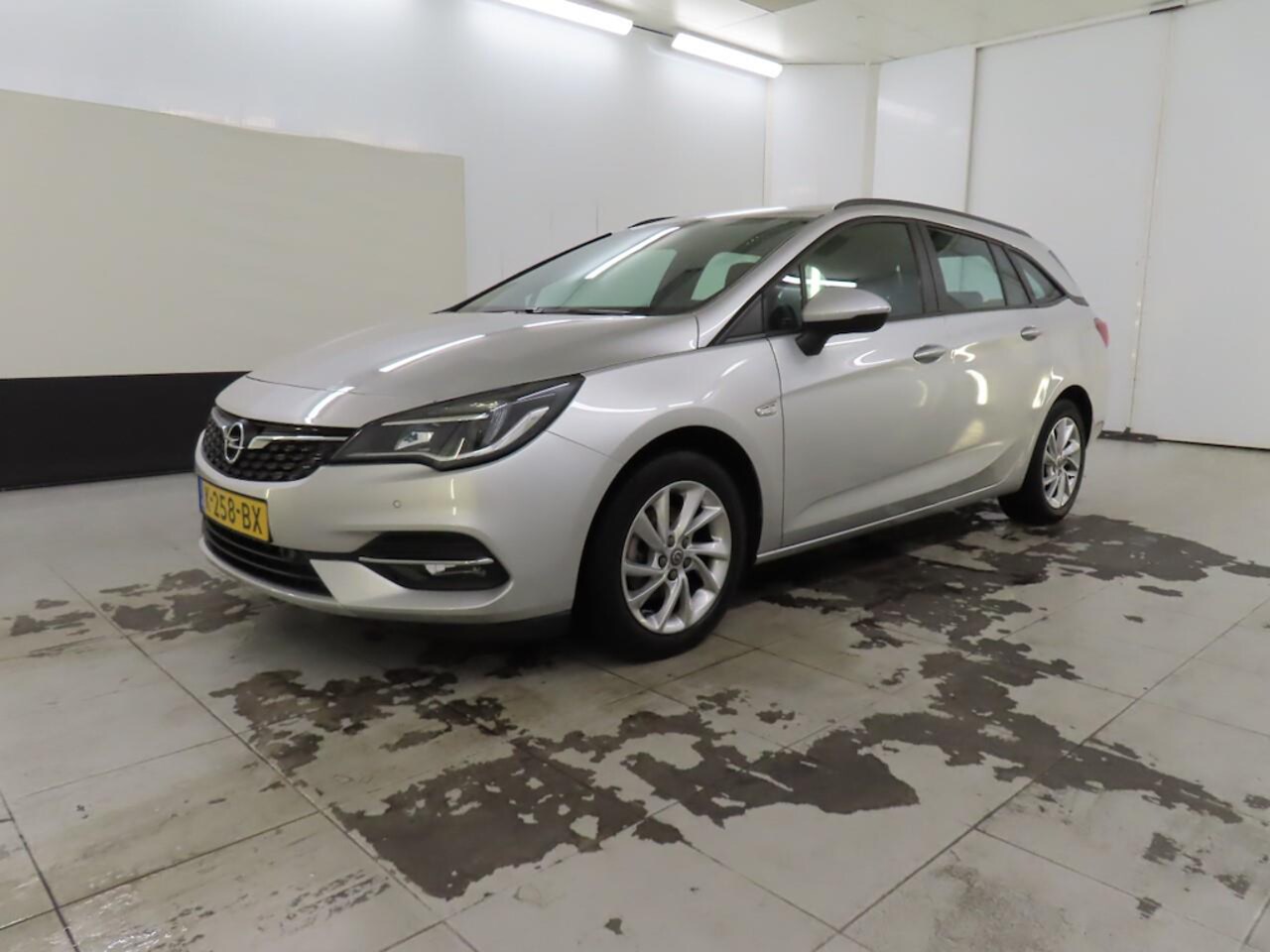 Opel Astra Sports Tourer - 1.2 Turbo 110pk ECC, NAVI, BLUET, L.M. VELG. - AutoWereld.nl