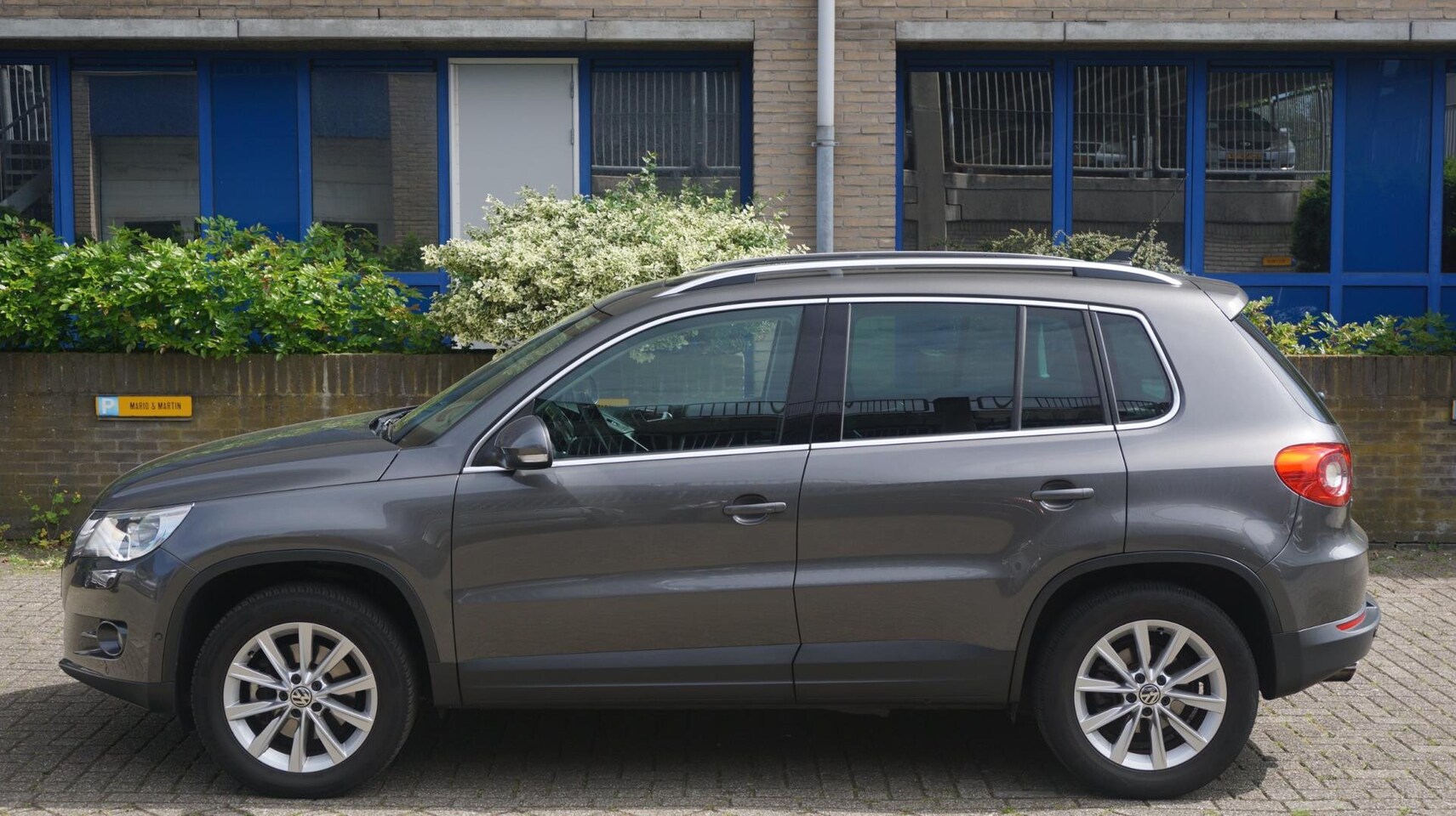 Volkswagen Tiguan - 1.4 TSI 150PK Sport & Style - AutoWereld.nl
