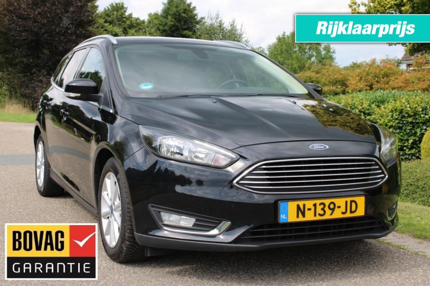 Ford Focus Wagon - Wagon 1.0 125pk Titanium ECC/cruise/navi/PDC/trekhaak - AutoWereld.nl