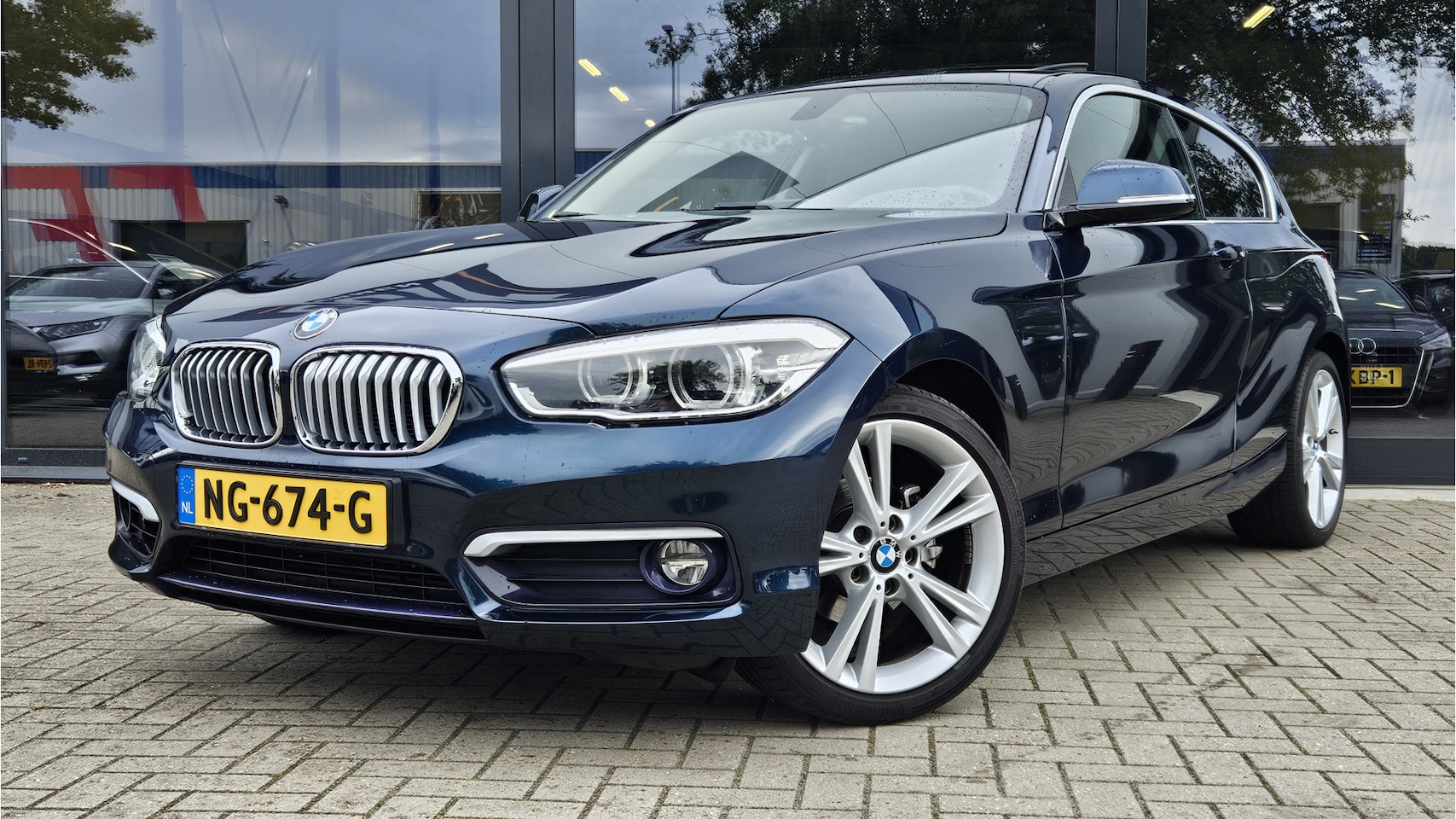 BMW 1-serie - 118i Centennial High Executive + HARMAN KARDON + SCHUIFDAK + LED + KEYLESS - AutoWereld.nl