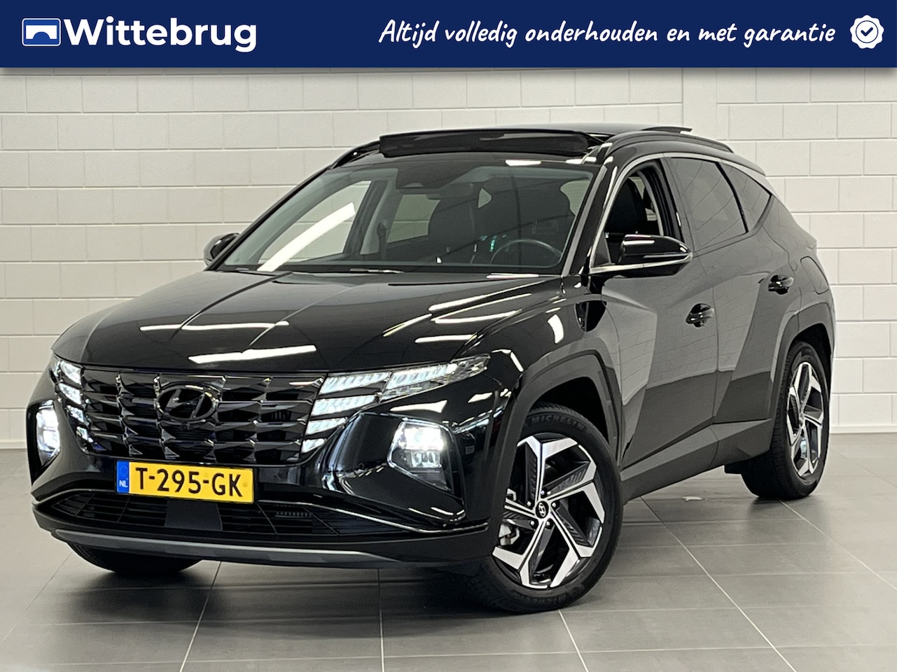 Hyundai Tucson - 1.6 T-GDI PHEV Premium Sky 4WD TREKHAAK | PANORAMADAK | LEDER | FULL OPTIONS - AutoWereld.nl