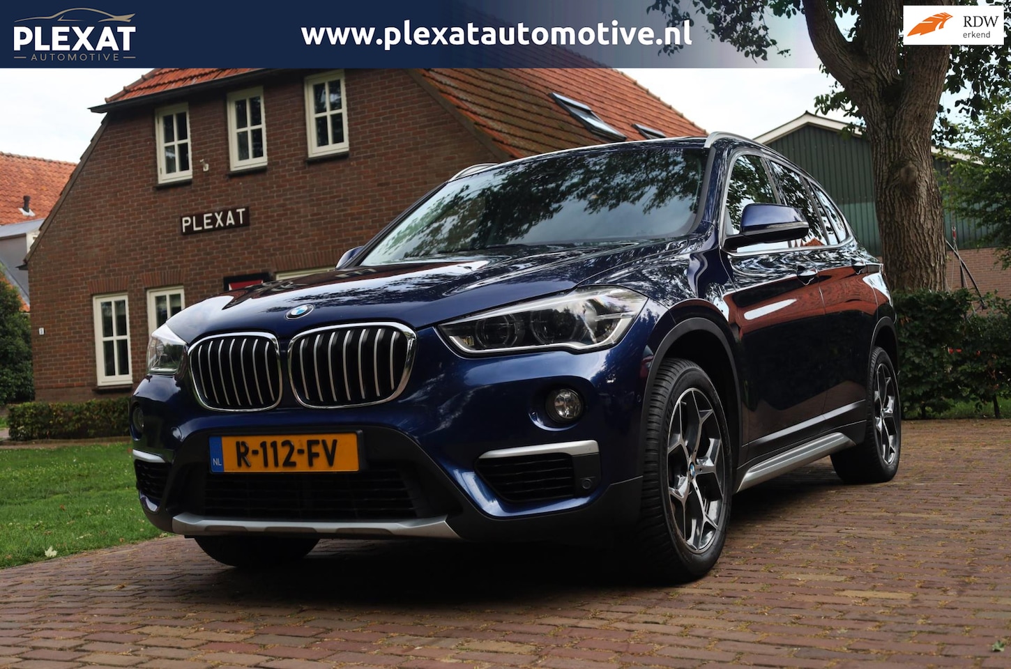 BMW X1 - SDrive18i High Executive Aut. | Panorama | Facelift | HUD | Memory Seats | Botspreventie | - AutoWereld.nl