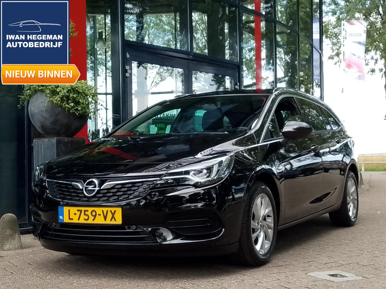 Opel Astra Sports Tourer - 1.2 130 PK Business Elegance | Trekhaak | LED | Cruise Control | Climate Control | Parkeer - AutoWereld.nl
