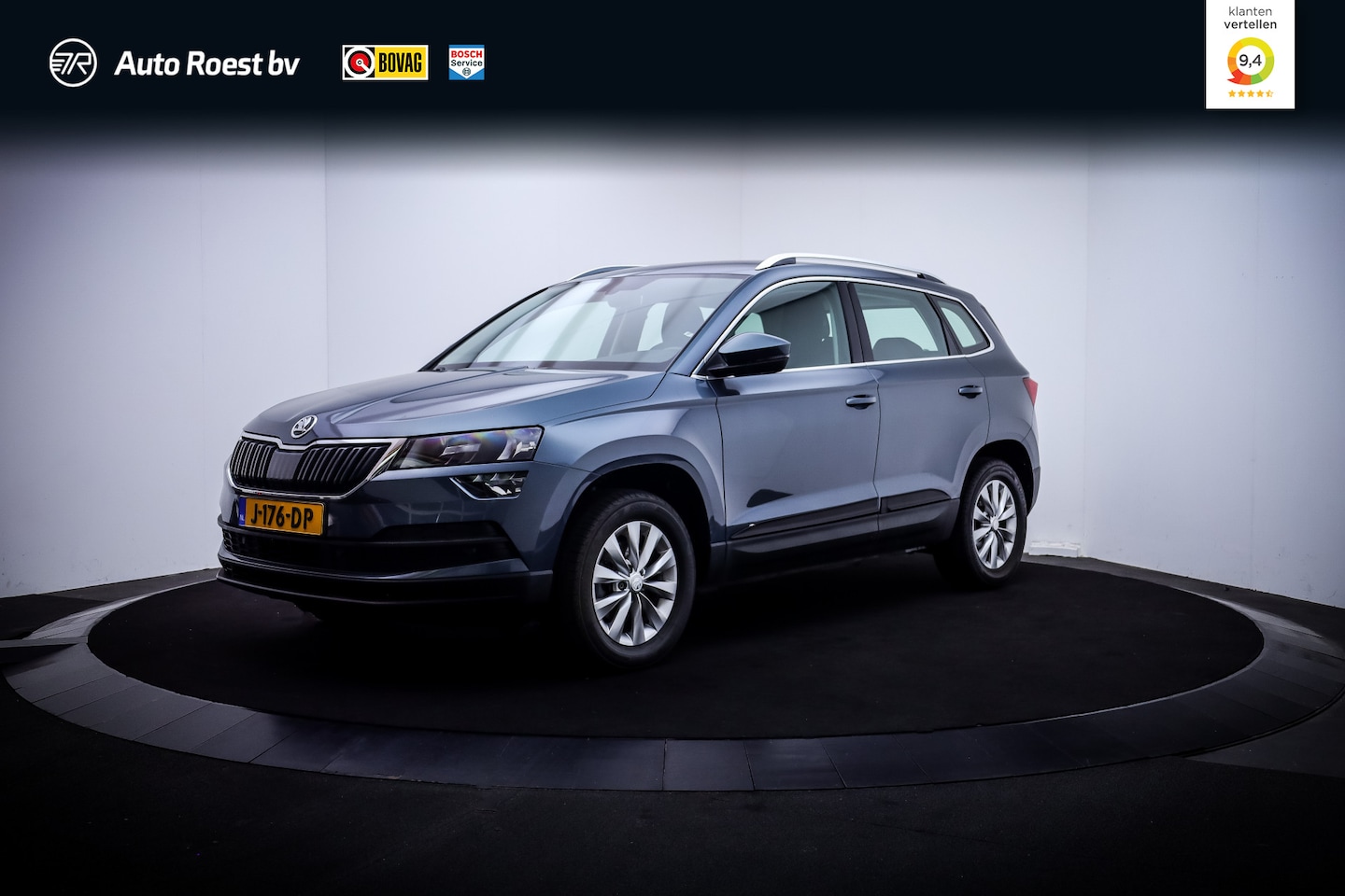 Skoda Karoq - 1.0 TSI Ambition Business CAMERA | CARPLAY | DAB | NAVI | STOELVERW | TREKHAAK | CLIMA | C - AutoWereld.nl