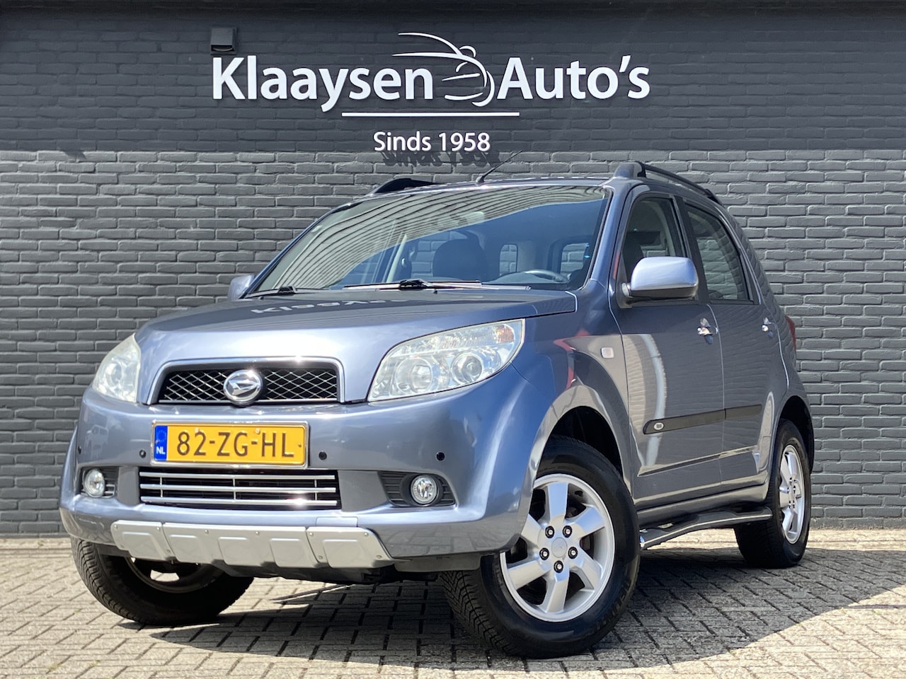 Daihatsu Terios - 1.5-16v Expedition 2WD AUT. | airco | dab audio | leder interieur | trekhaak | parkeersens - AutoWereld.nl