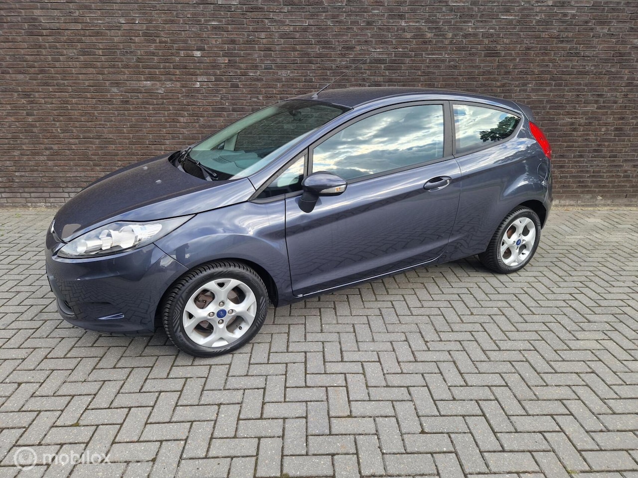 Ford Fiesta - 1.25 Limited Cool&Sound|Airco|2xSleutel| - AutoWereld.nl