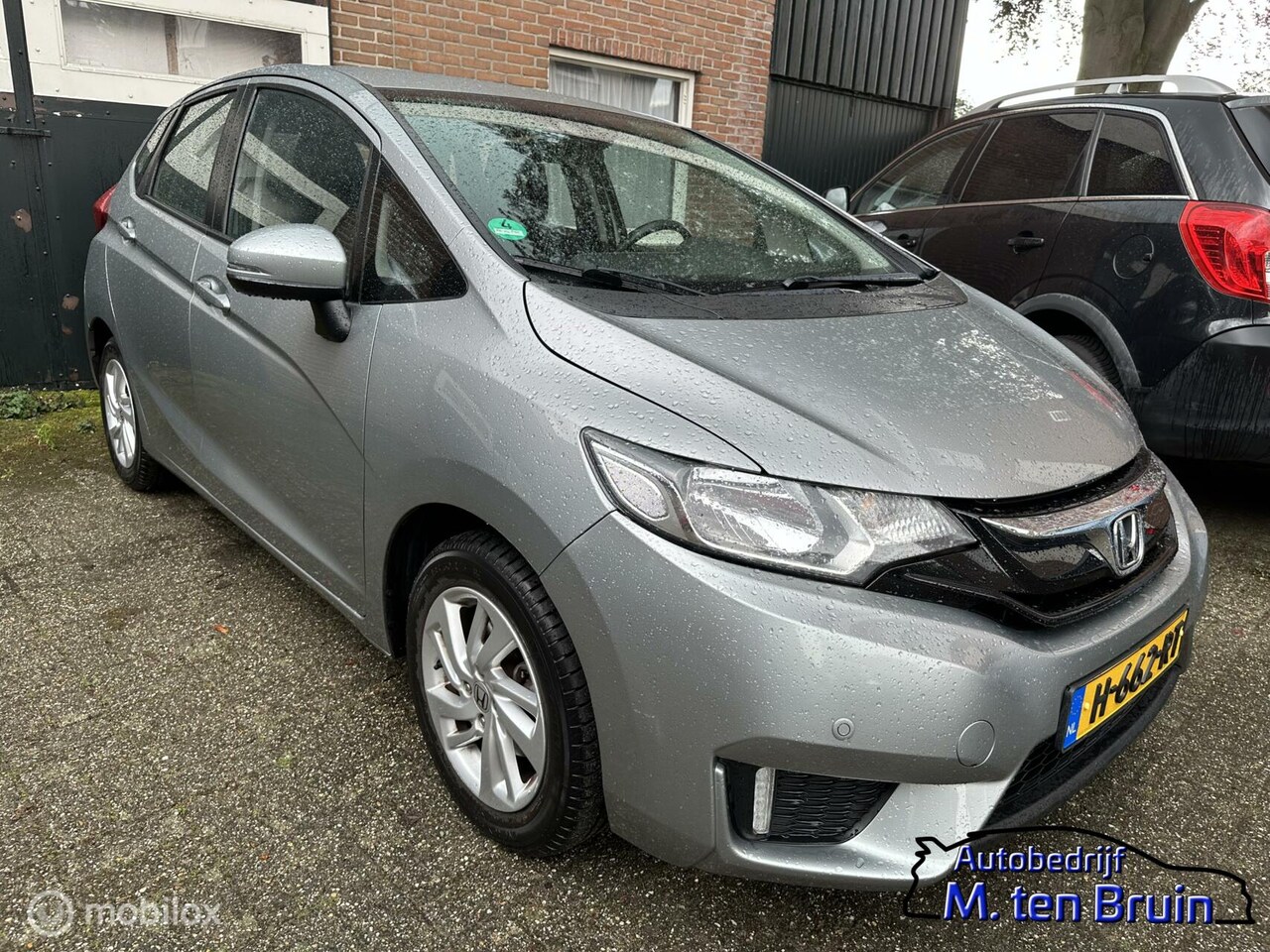 Honda Jazz - 1.3 i-VTEC Comfort/AUT/NAVI - AutoWereld.nl