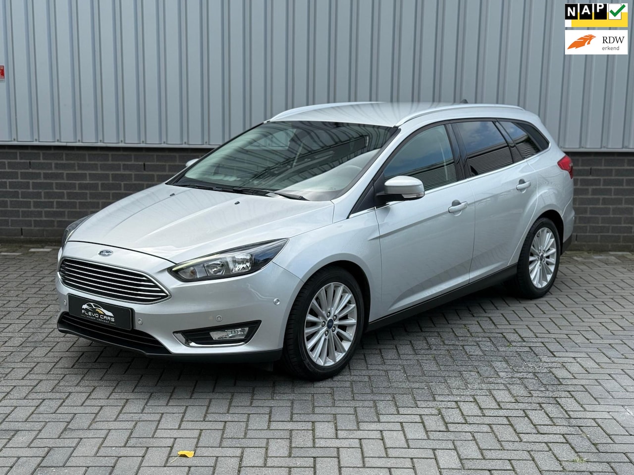 Ford Focus Wagon - 1.0 Titanium |Navi|CruiseCtrl|Airco|PDC| - AutoWereld.nl