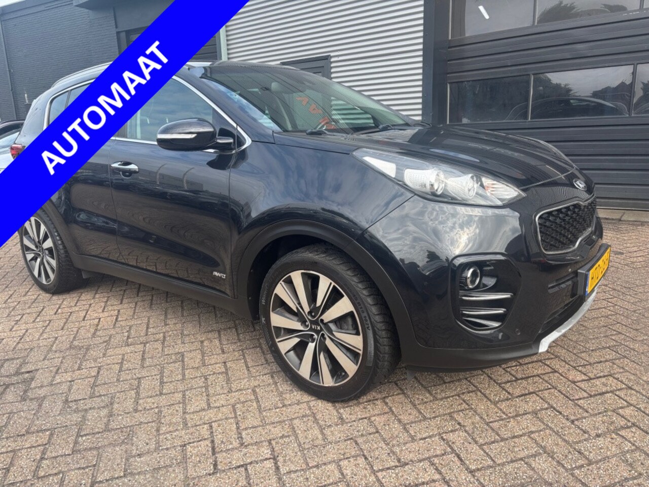 Kia Sportage - 1.6 T-GDI AUTOMAAT 4WD GT-LINE 6 MND GAR | LEER | NAVI | CRUISE - AutoWereld.nl