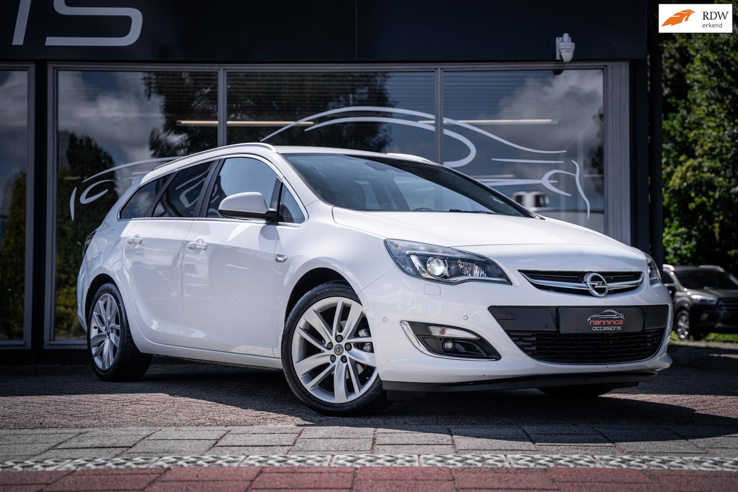 Opel Astra Sports Tourer - 1.4 Turbo Sport +|Leder|Xenon|Trekhaak|Stoelverwarming|Cruise - AutoWereld.nl