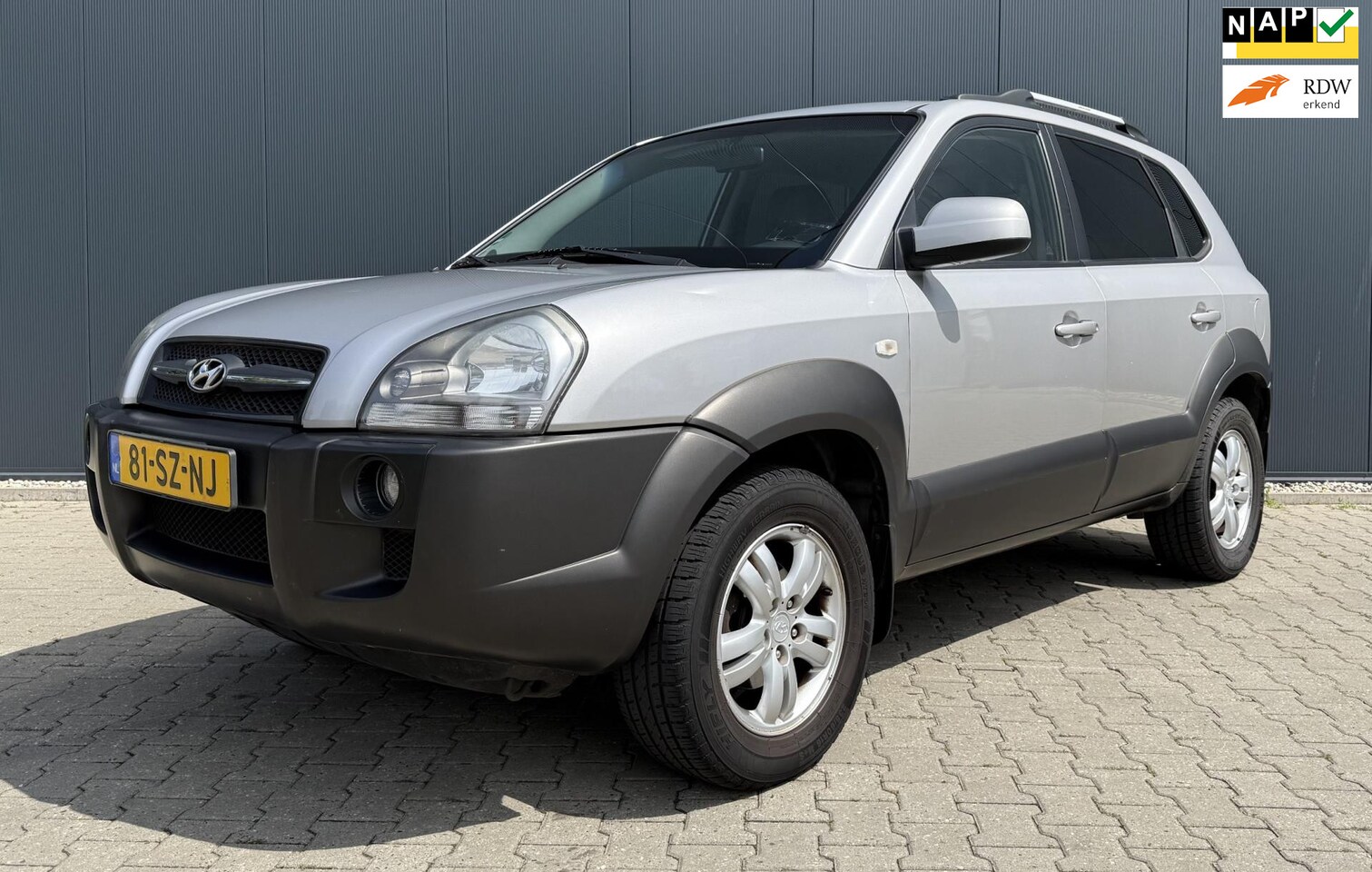 Hyundai Tucson - 2.0i Dynamic World Cup edition Airco Trekhaak - AutoWereld.nl