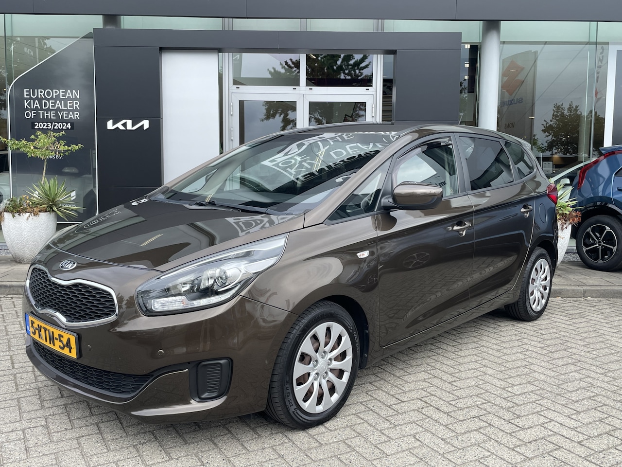 Kia Carens - 1.6 GDi ComfortLine // 7 Zitter // Trekhaak // Camera // Navi. - AutoWereld.nl