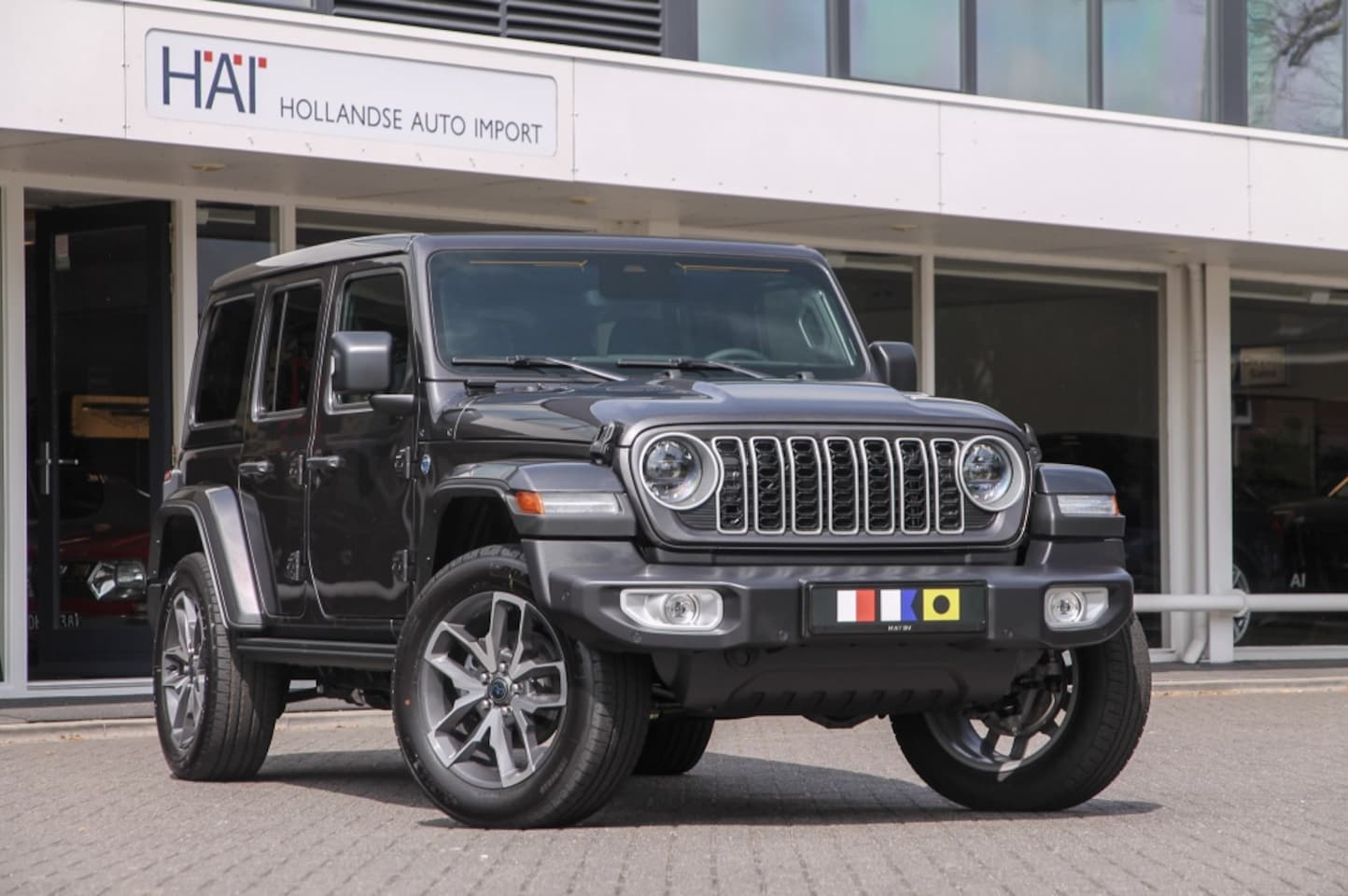 Jeep Wrangler Unlimited - 4xe 380 Sahara I Sky One I 4 JAAR GARANTIE - AutoWereld.nl