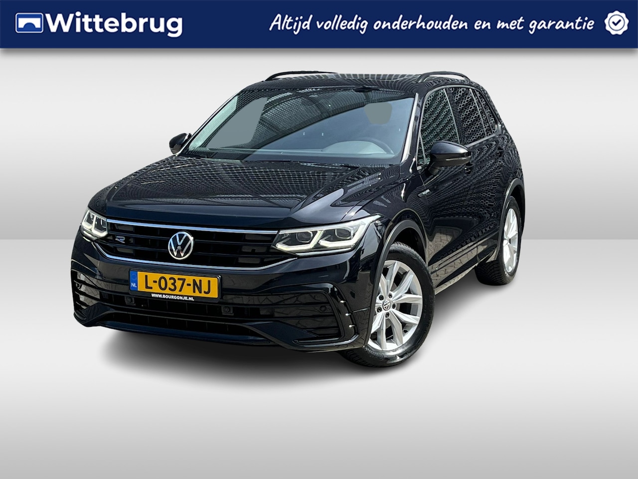 Volkswagen Tiguan - 1.5 TSI R-Line Business+ / R-Line Interieur + Exterieur / Black Style / Panoramadak / Digi - AutoWereld.nl