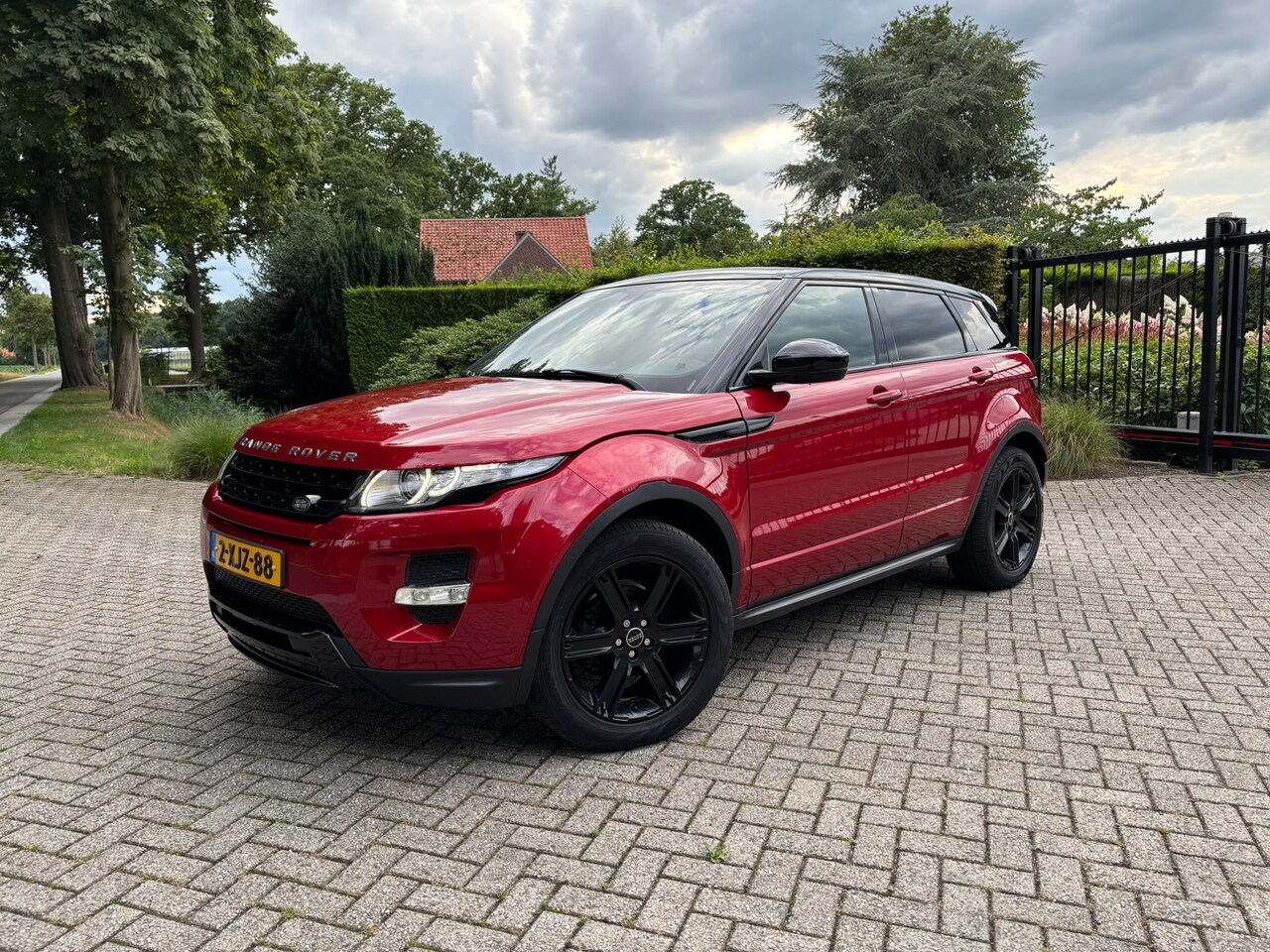 Land Rover Range Rover Evoque - 2.2 eD4 2WD Dynamic 2014 Firenze Red - AutoWereld.nl