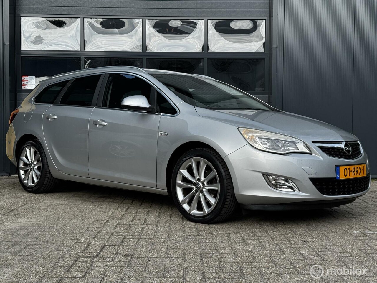 Opel Astra Sports Tourer - 1.4 Turbo 1.4 Turbo,Airco, trekhaak, vol ODH - AutoWereld.nl